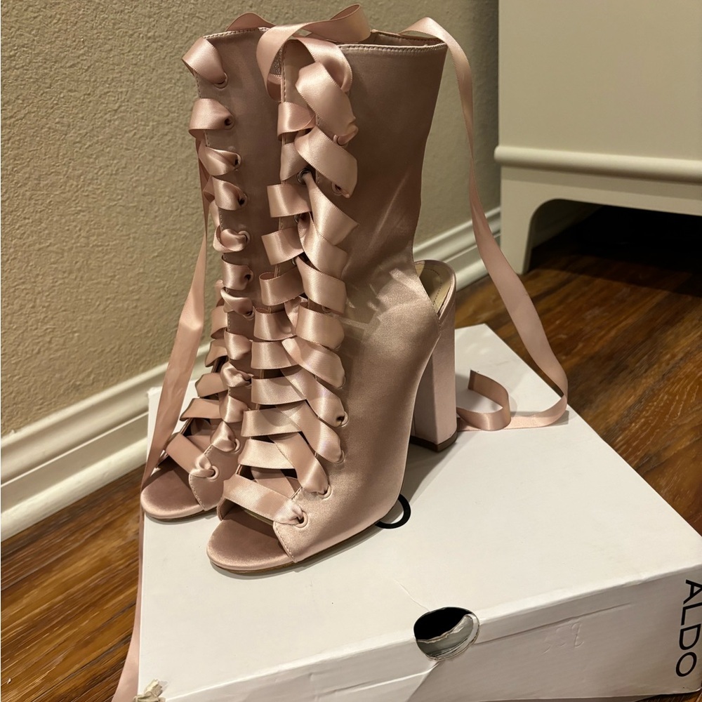 Pink/rose gold lace up boots. Size 9